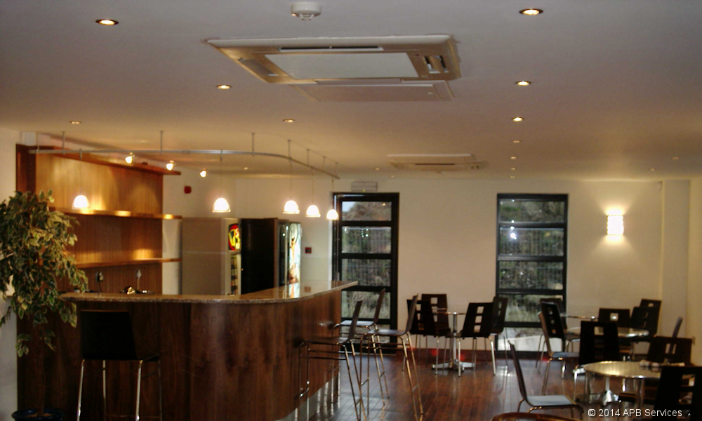 Example ceiling based air conditioning system installed into a cafe